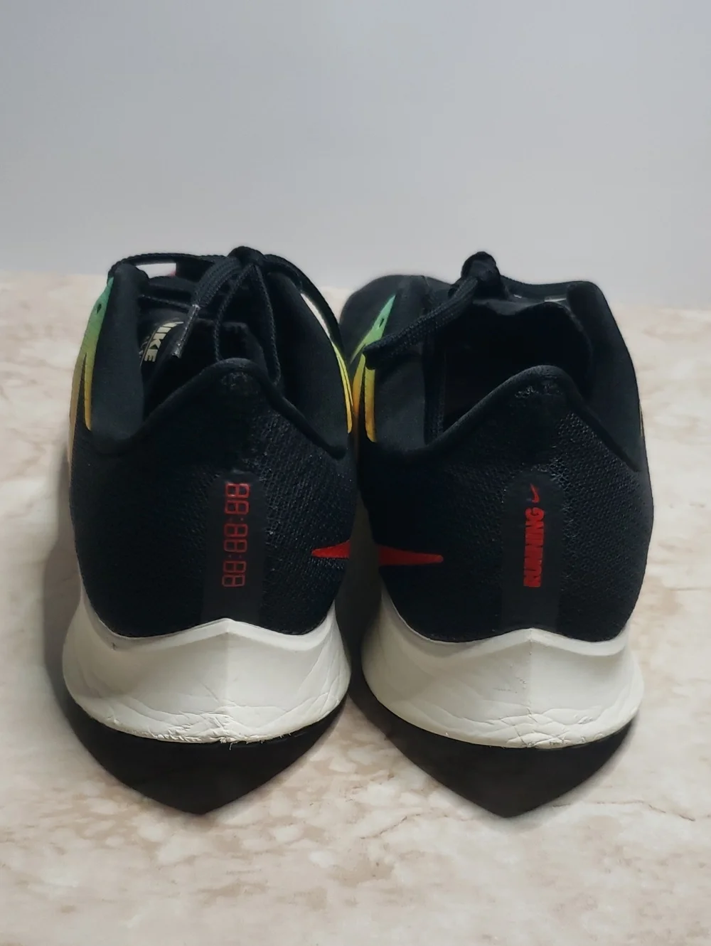 Nike Men’s Black Running Sneakers with Teal, Yellow & Red Accents 7.5